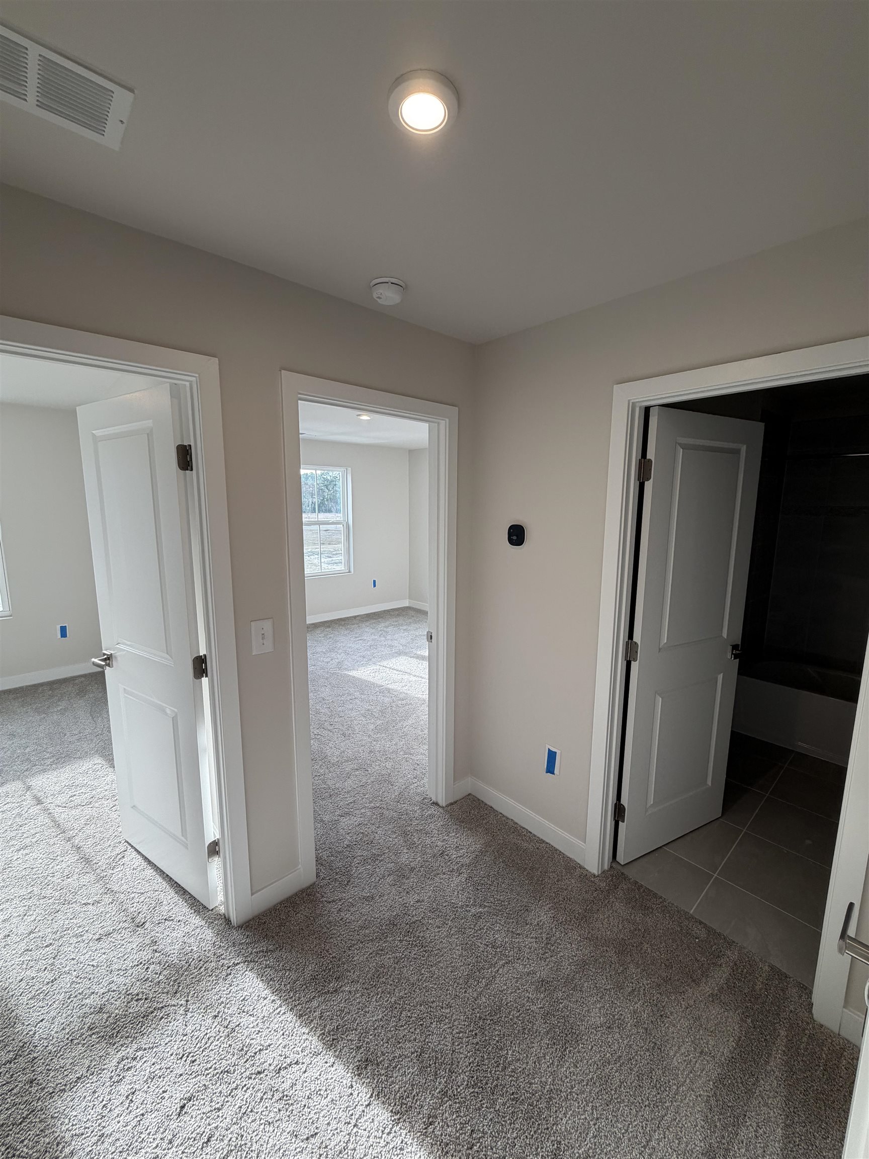 1311 Pleasant View Drive, Unit F North Myrtle Beach, SC 29582 - Photo 8 of 13 Hall with light carpet