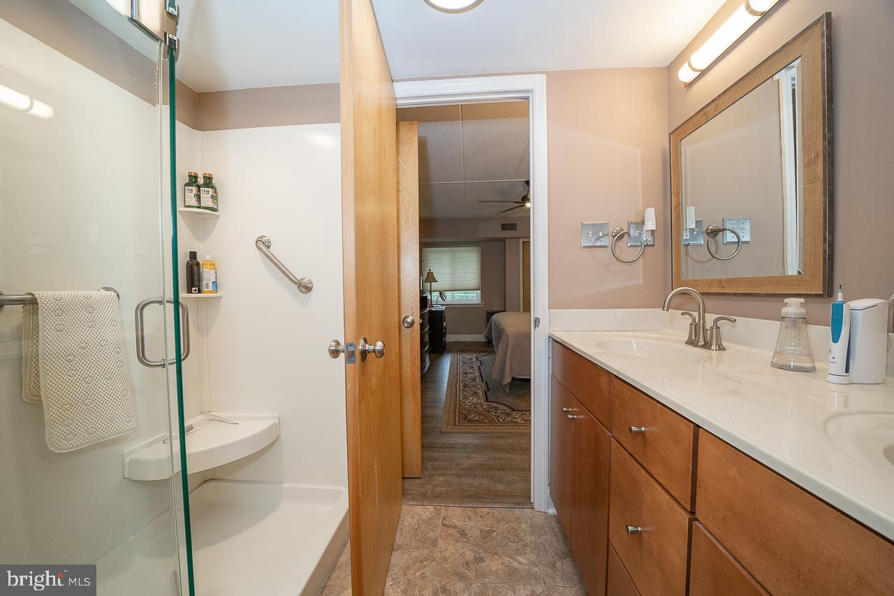 1219 West Wynnewood Road, Unit 415 Wynnewood, PA 19096 - Photo 38 of 57 Stall Shower with Seat