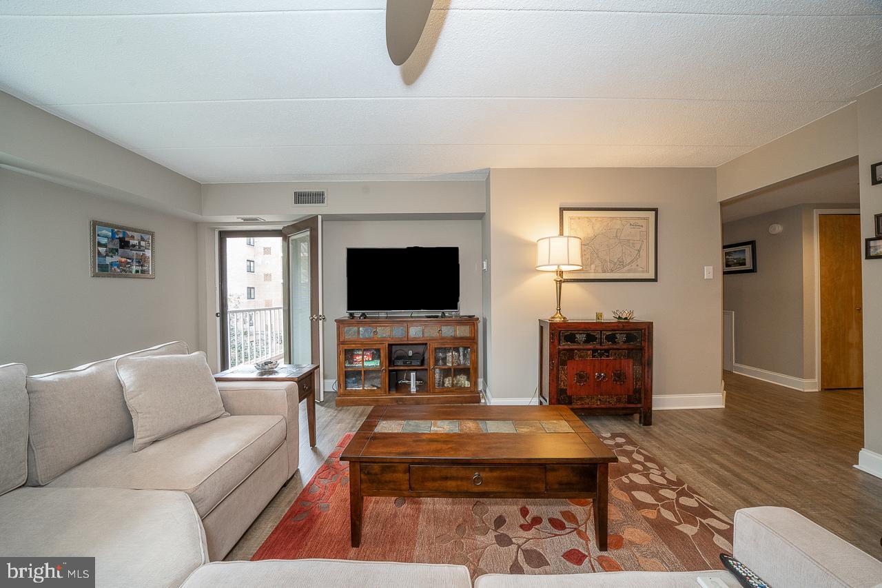 1219 West Wynnewood Road, Unit 415 Wynnewood, PA 19096 - Photo 9 of 57 Living Room with Entrance to Balcony