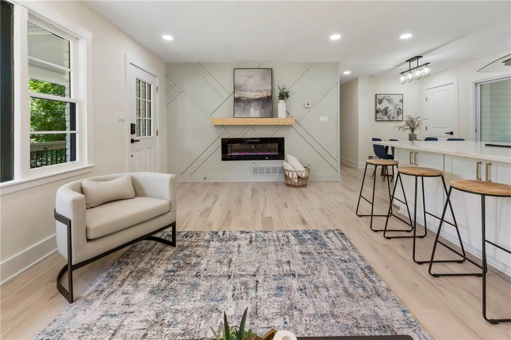 1690 Carter Road Decatur, GA 30032 - Photo 11 of 49 a living room with furniture and a large window