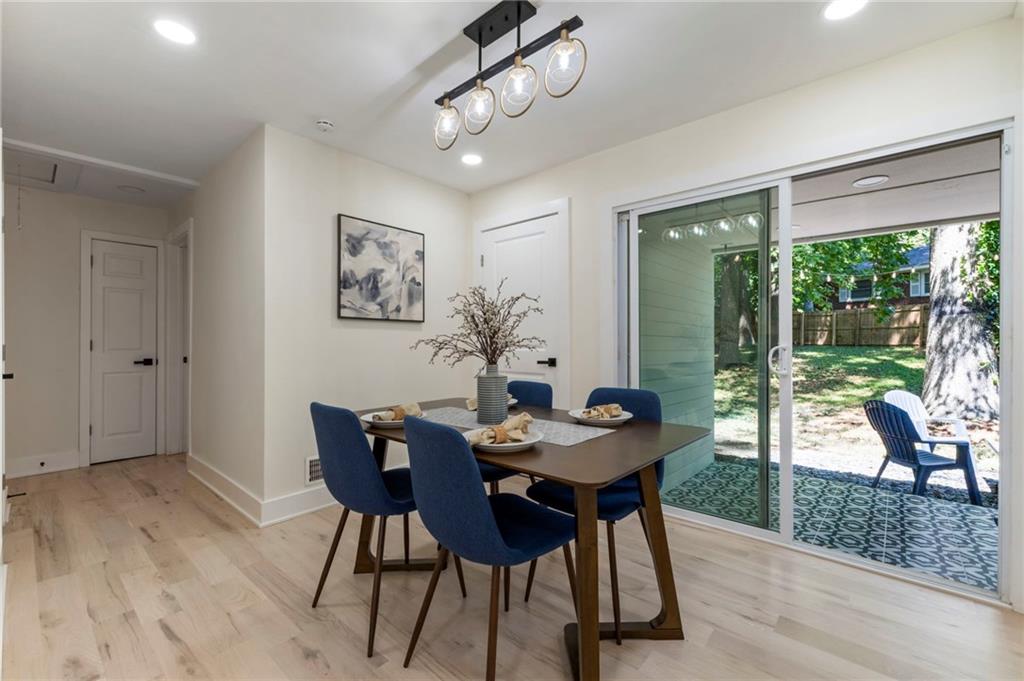 1690 Carter Road Decatur, GA 30032 - Photo 16 of 49 a view of a dining room with furniture window and outside view