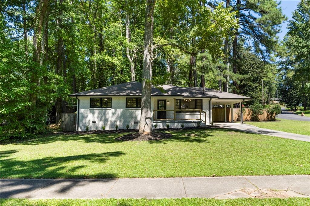 1690 Carter Road Decatur, GA 30032 - Photo 2 of 49 a view of a house with a yard