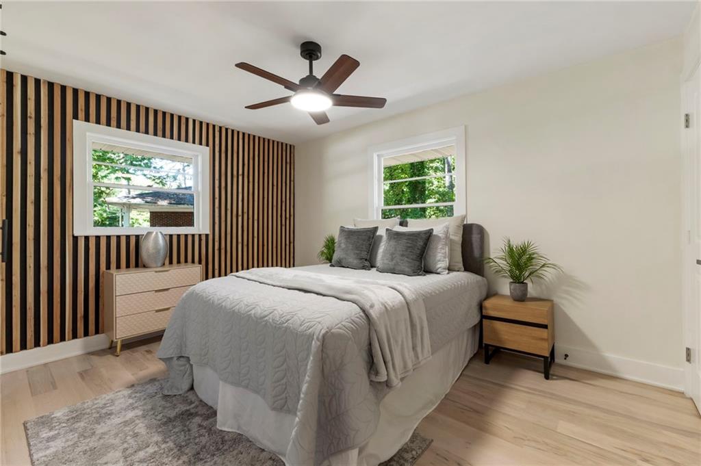 1690 Carter Road Decatur, GA 30032 - Photo 26 of 49 a bedroom with a large bed and a window