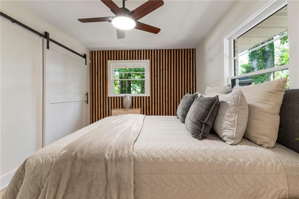 1690 Carter Road Decatur, GA 30032 - Photo 31 of 49 a bedroom with a bed and a window