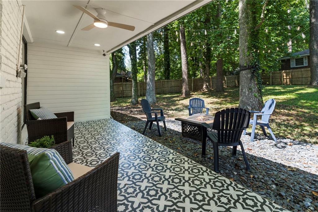 1690 Carter Road Decatur, GA 30032 - Photo 44 of 49 a outdoor living space with patio furniture and a potted plant