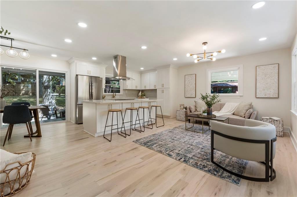 1690 Carter Road Decatur, GA 30032 - Photo 6 of 49 a living room with furniture and kitchen view