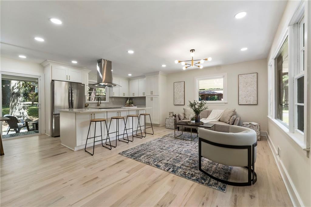 1690 Carter Road Decatur, GA 30032 - Photo 9 of 49 a living room with furniture and kitchen view