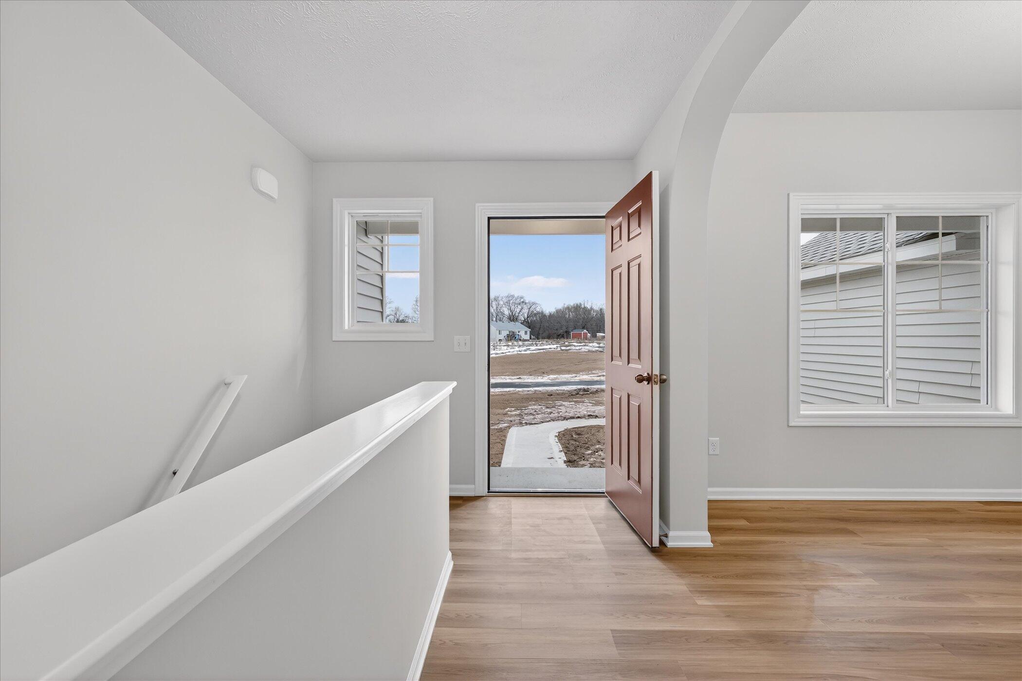 3575 13 Mile Road Northeast Rockford, MI 49341 - Photo 2 of 39 06-11247-Vergennes-St-SE-Windowstill