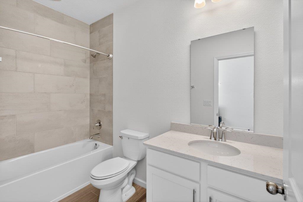 210 White Rabbit Run St. Augustine, FL 32092 - Photo 16 of 85 a bathroom with a sink toilet and shower