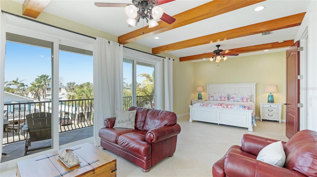 4101 4th Avenue Holmes Beach, FL 34217 - Photo 30 of 60 a living room with furniture and a large window