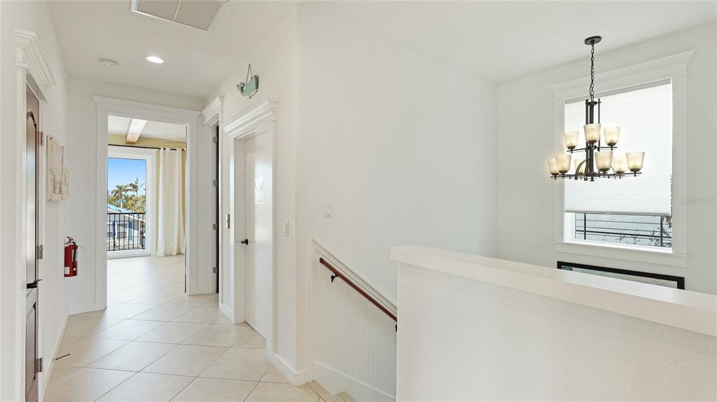 4101 4th Avenue Holmes Beach, FL 34217 - Photo 36 of 60 a view of hallway with livingroom and window