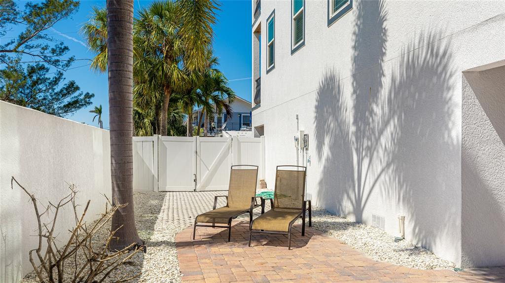 4101 4th Avenue Holmes Beach, FL 34217 - Photo 57 of 60 a view of a patio with iron fence