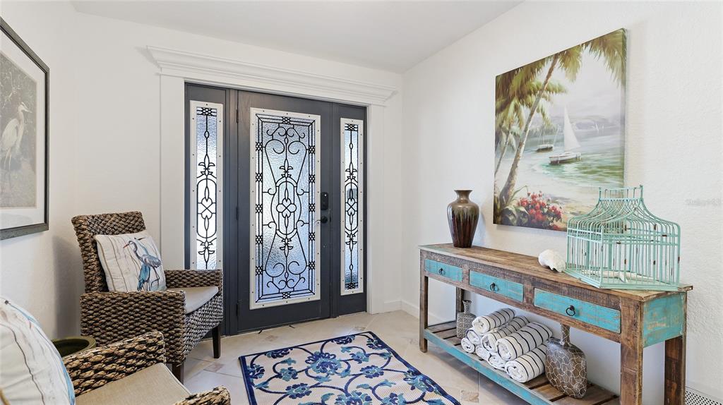 4101 4th Avenue Holmes Beach, FL 34217 - Photo 6 of 60 a living room with furniture and a window