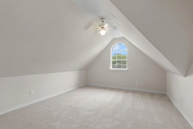a bathroom with a toilet a sink and a mirror