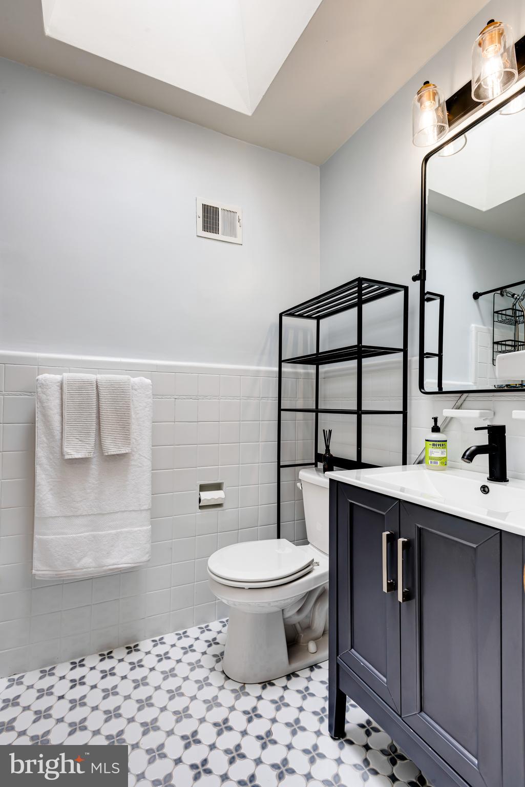 649 Maris Street Philadelphia, PA 19128 - Photo 14 of 28 Updated Bathroom with skylight