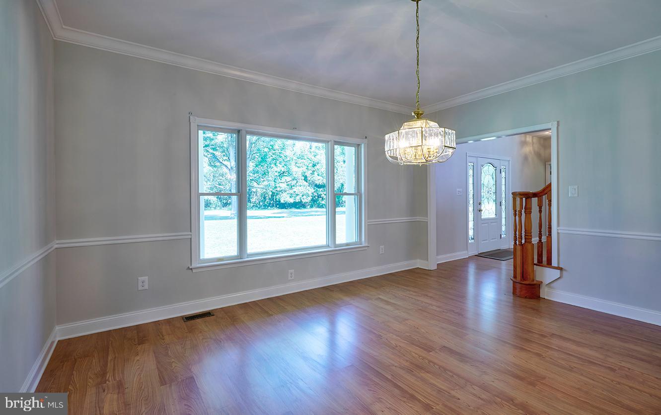 2582 Monmouth Road Jobstown, NJ 08041 - Photo 15 of 65 a view of a room with wooden floor fan and window