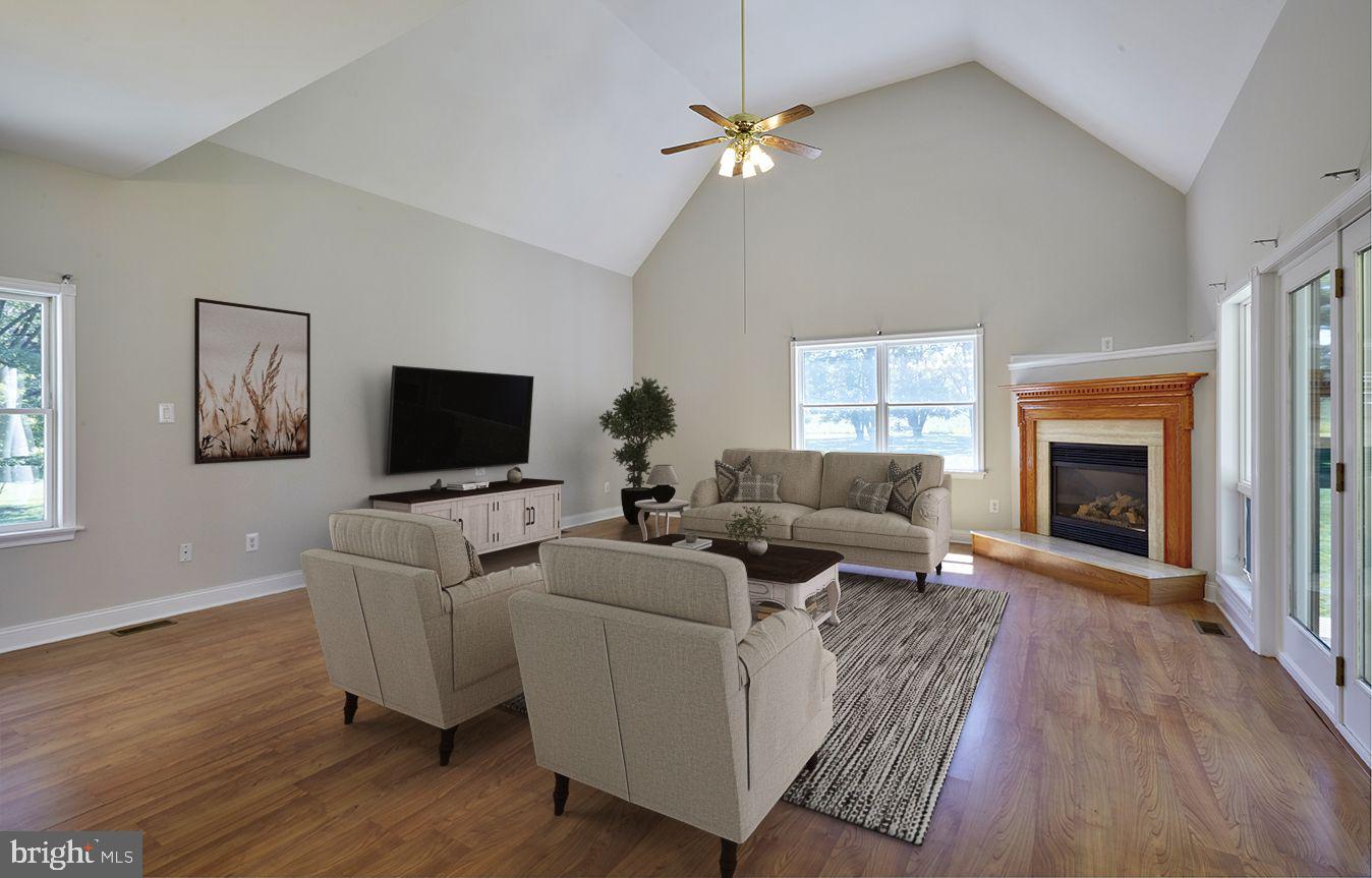 2582 Monmouth Road Jobstown, NJ 08041 - Photo 34 of 65 a living room with furniture and a fireplace