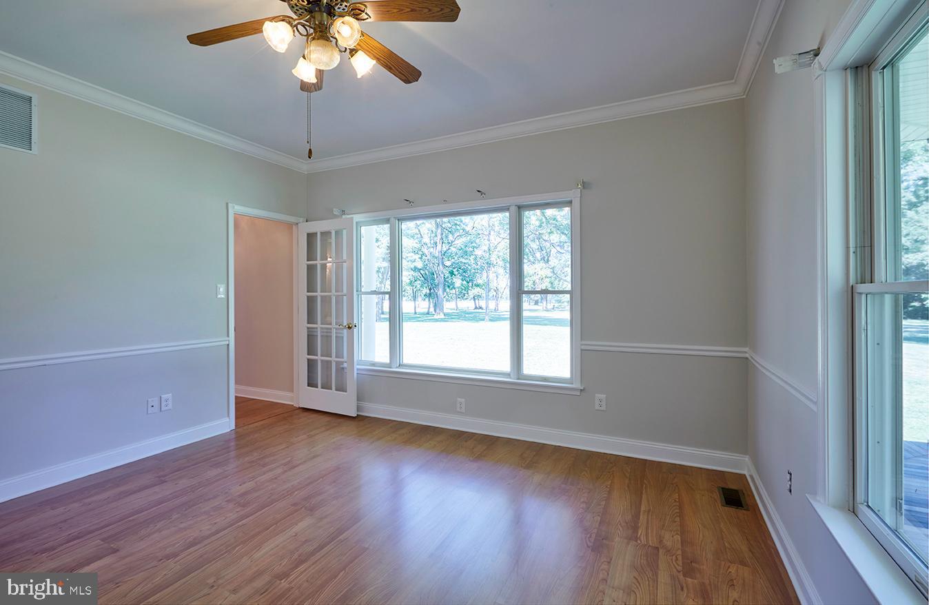 2582 Monmouth Road Jobstown, NJ 08041 - Photo 44 of 65 wooden floor in an empty room with a window