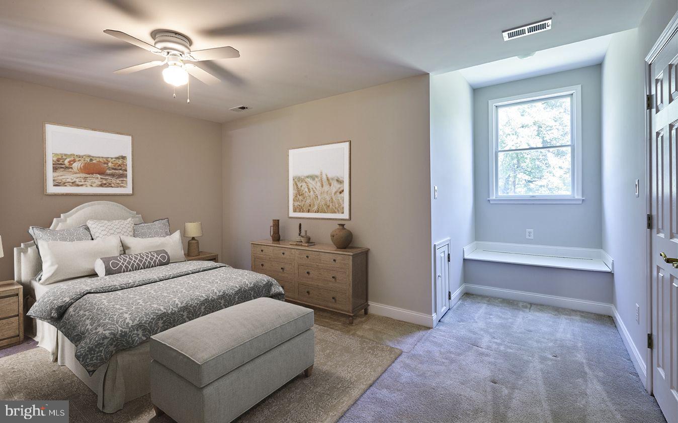 2582 Monmouth Road Jobstown, NJ 08041 - Photo 50 of 65 a spacious bedroom with a bed and a chandelier