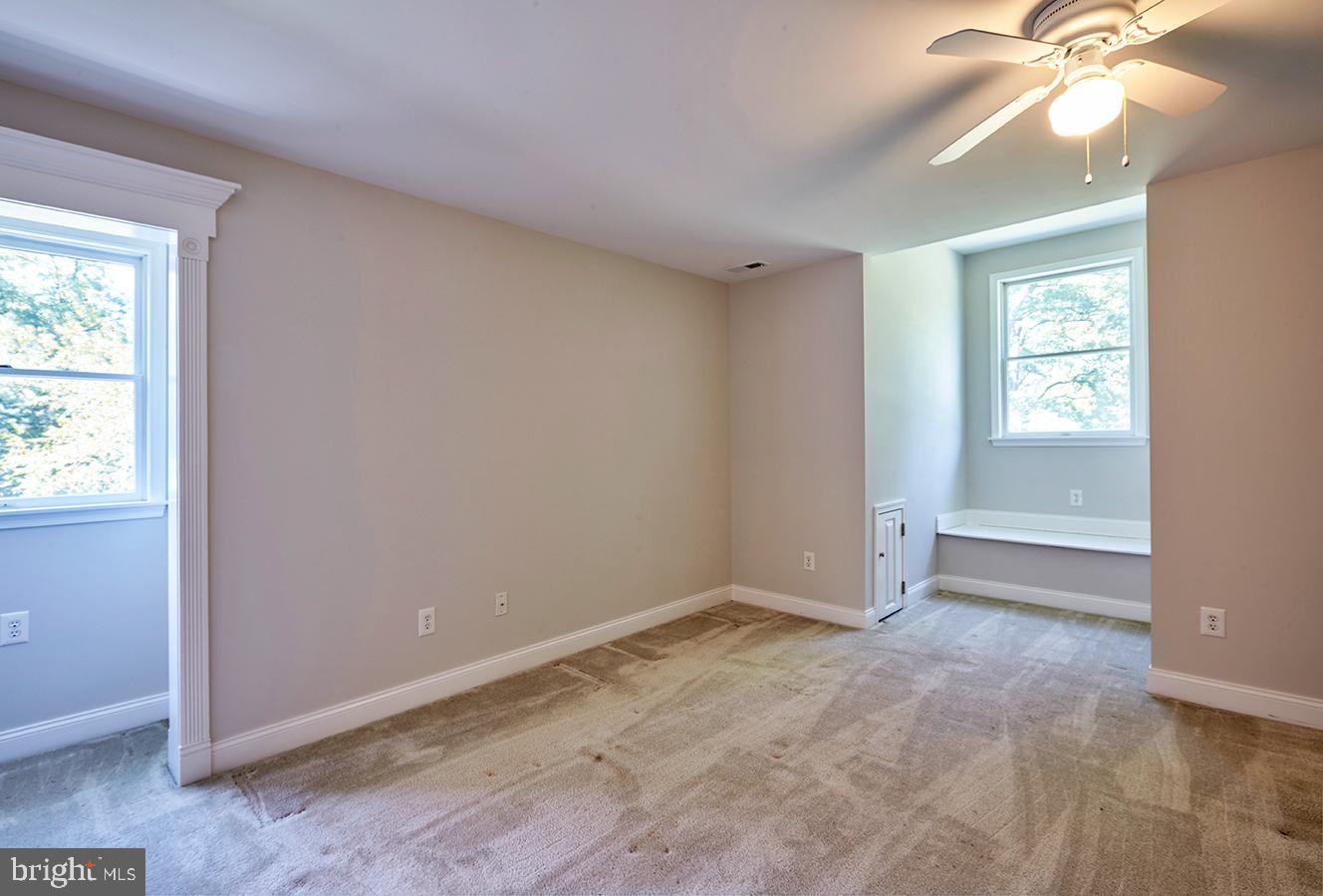 2582 Monmouth Road Jobstown, NJ 08041 - Photo 59 of 65 an empty room with windows and fan