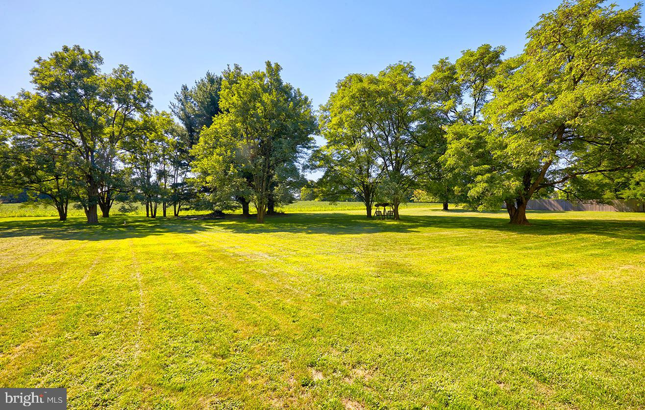 2582 Monmouth Road Jobstown, NJ 08041 - Photo 6 of 65 a view of swimming pool with an outdoor space and seating area