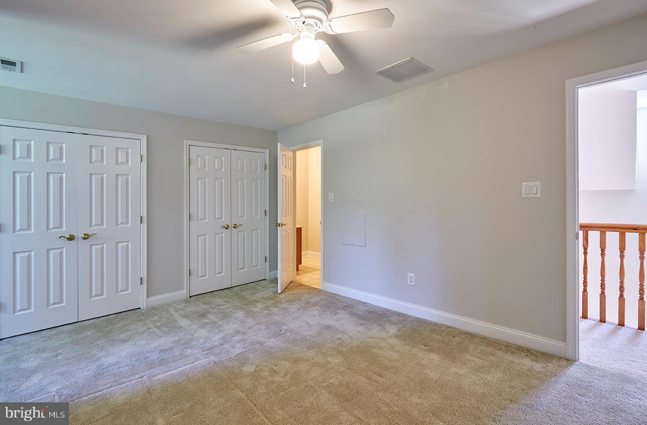 2582 Monmouth Road Jobstown, NJ 08041 - Photo 65 of 65 an empty room with fan and windows