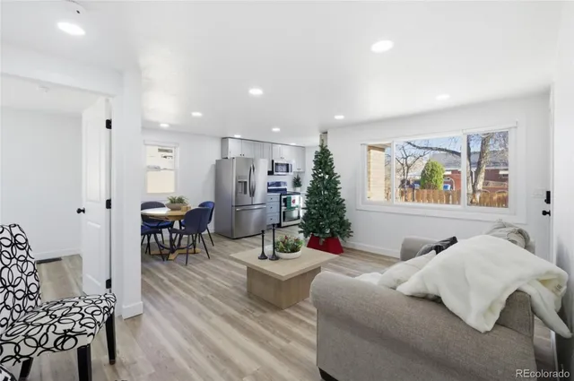 a bed room with furniture and a window