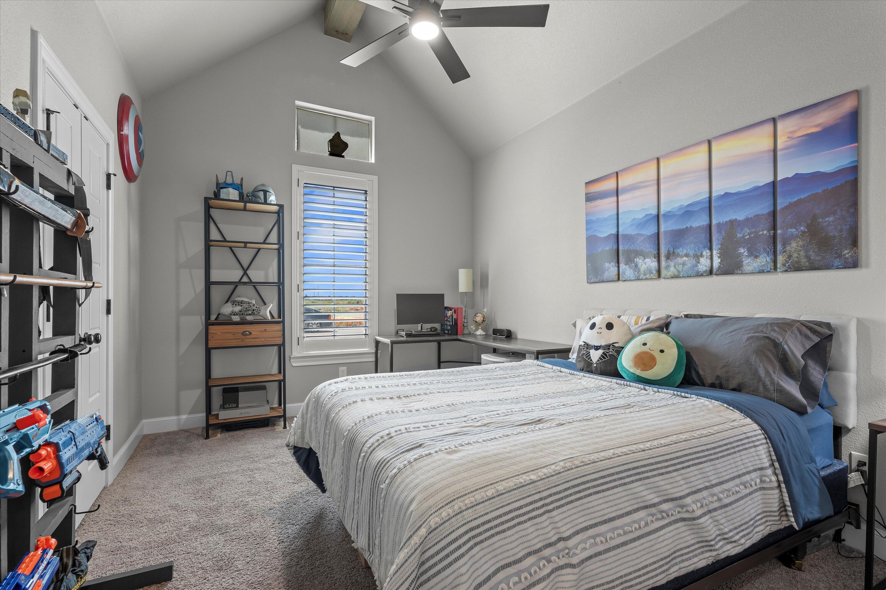 7002 103rd Street Lubbock, TX 79424 - Photo 20 of 35 a bedroom with a bed and a window
