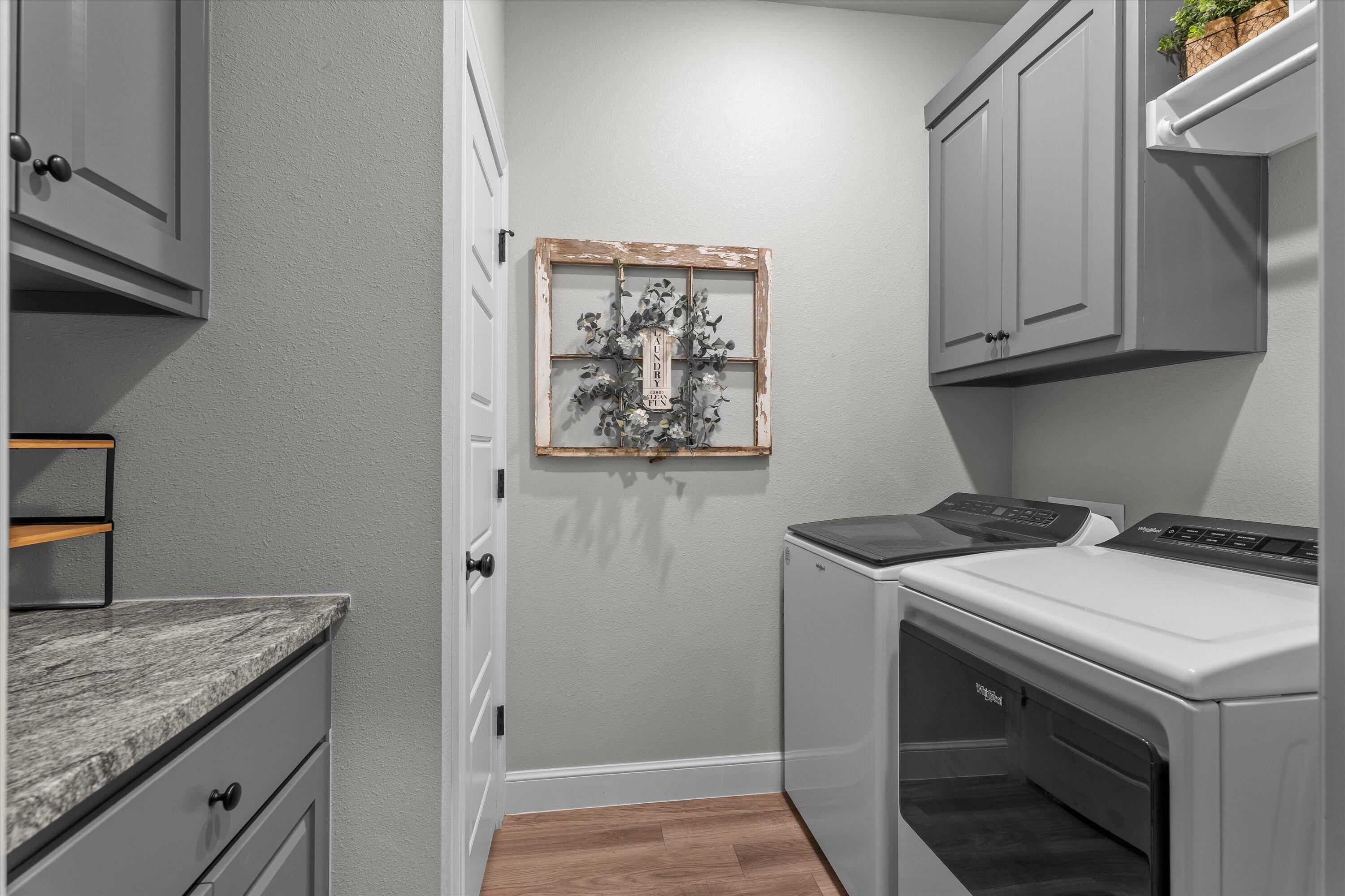 7002 103rd Street Lubbock, TX 79424 - Photo 28 of 35 a utility room with dryer and washer