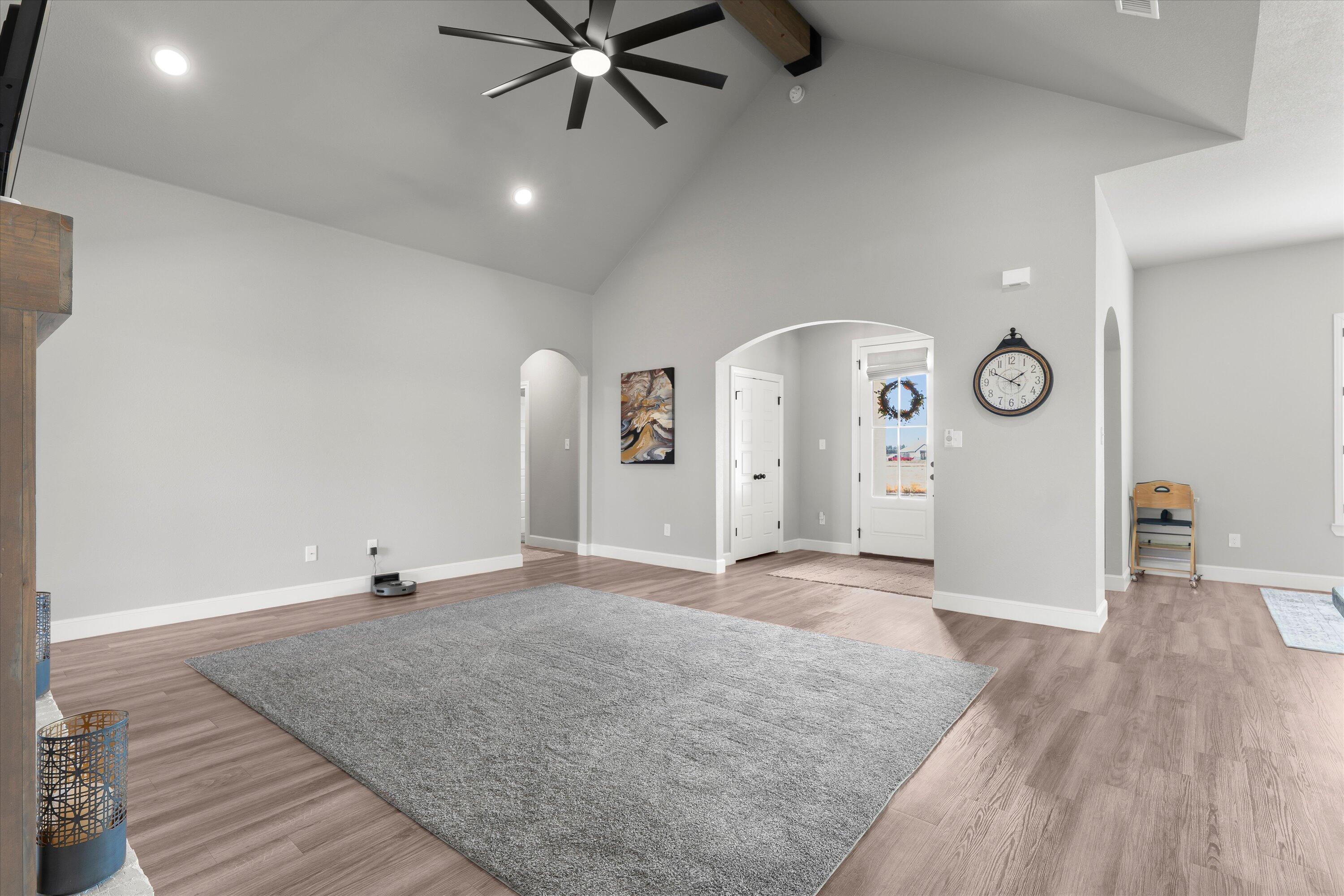 7002 103rd Street Lubbock, TX 79424 - Photo 8 of 35 a view of a livingroom with wooden floor