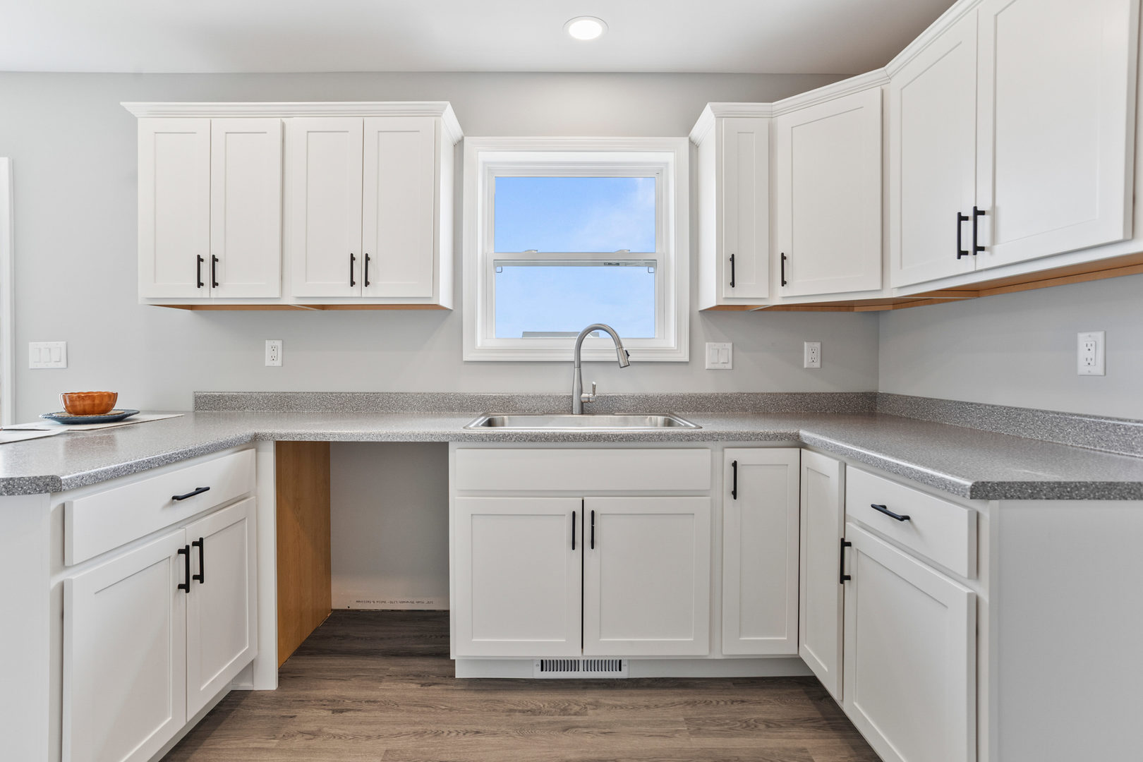 508 Patterson Drive Bloomington, IL 61701 - Photo 13 of 33 a kitchen with granite countertop white cabinets and white appliances
