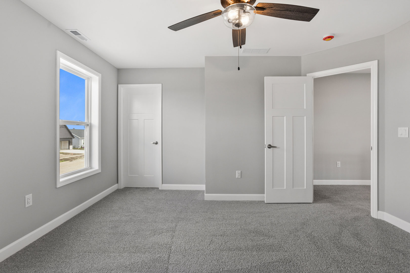 508 Patterson Drive Bloomington, IL 61701 - Photo 22 of 33 a view of an empty room with a window