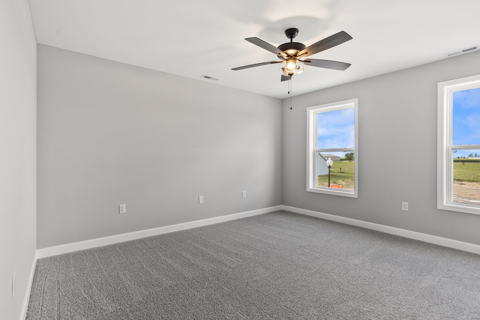 508 Patterson Drive Bloomington, IL 61701 - Photo 23 of 33 an a ceiling fan and window in a room