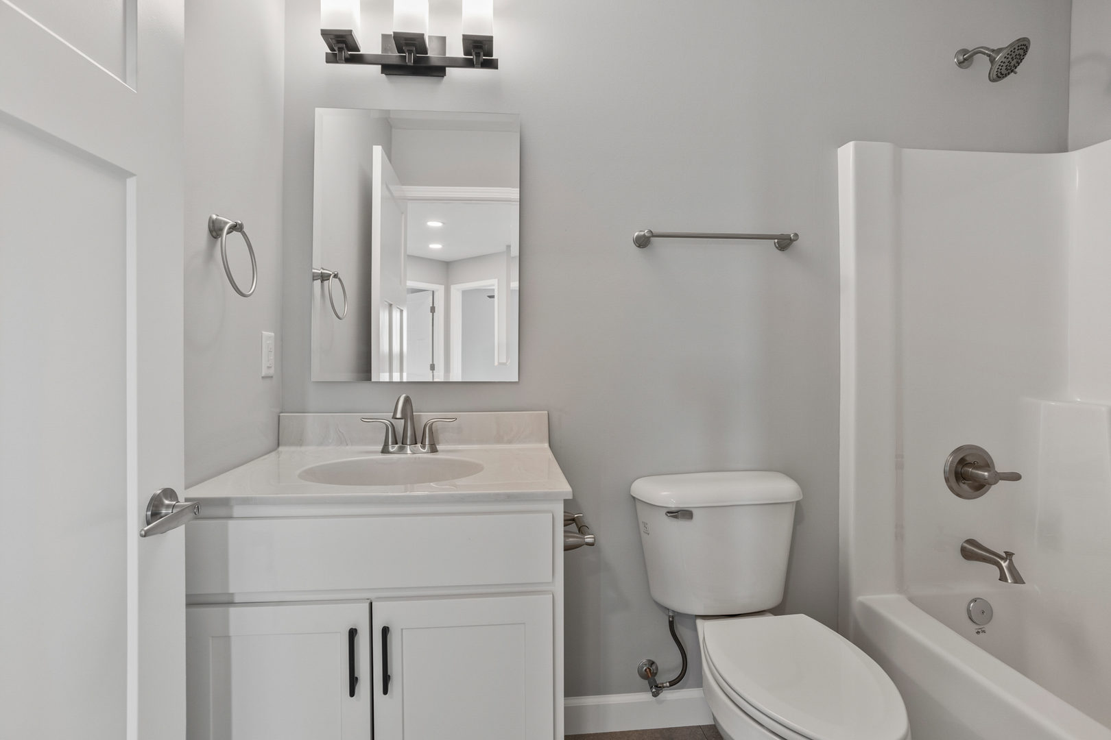 508 Patterson Drive Bloomington, IL 61701 - Photo 26 of 33 a bathroom with a sink toilet and shower