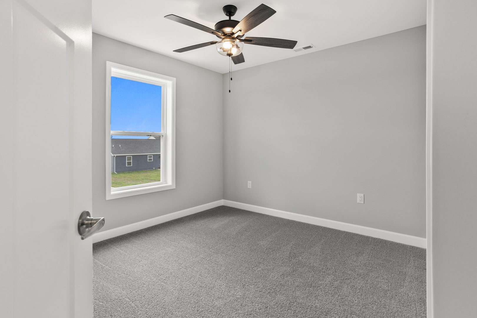 508 Patterson Drive Bloomington, IL 61701 - Photo 27 of 33 a view of an empty room with a window