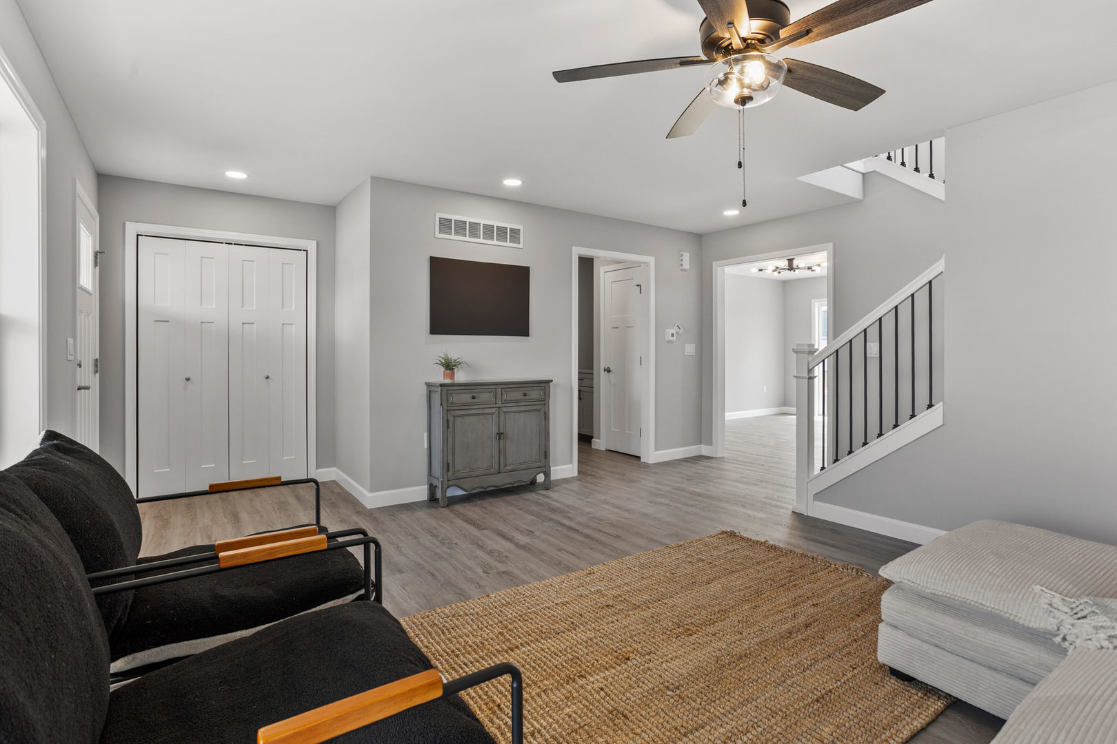 508 Patterson Drive Bloomington, IL 61701 - Photo 6 of 33 a living room with furniture and a flat screen tv