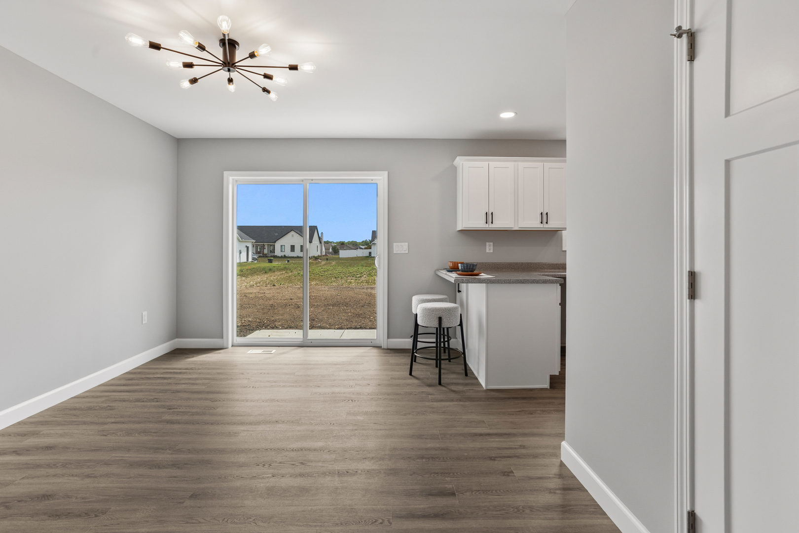 508 Patterson Drive Bloomington, IL 61701 - Photo 9 of 33 a view of a kitchen with a sink and a window