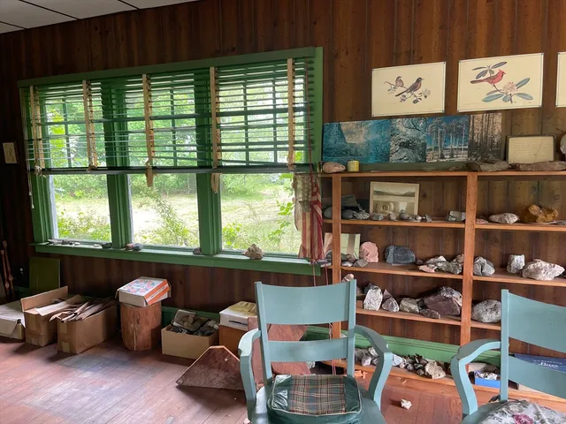 a room with furniture and a window