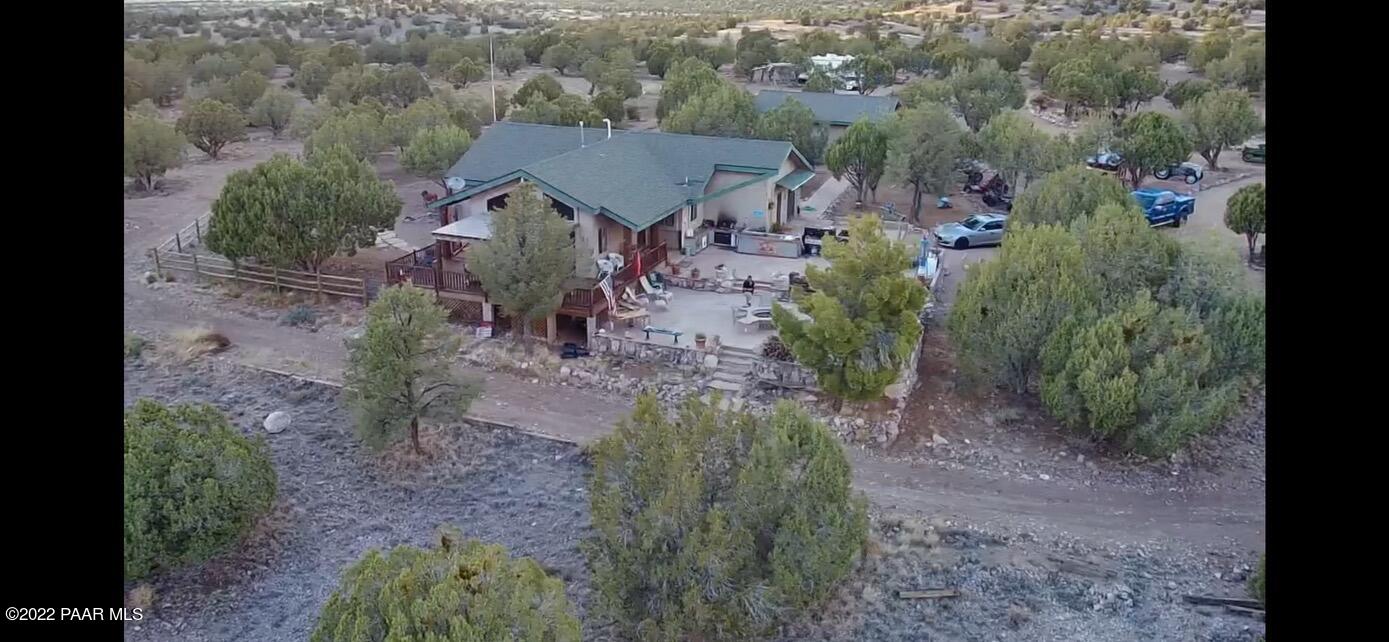 18100 Crossroads Ranch Road Prescott, AZ 86305 - Photo 17 of 40 a view of a house with a yard
