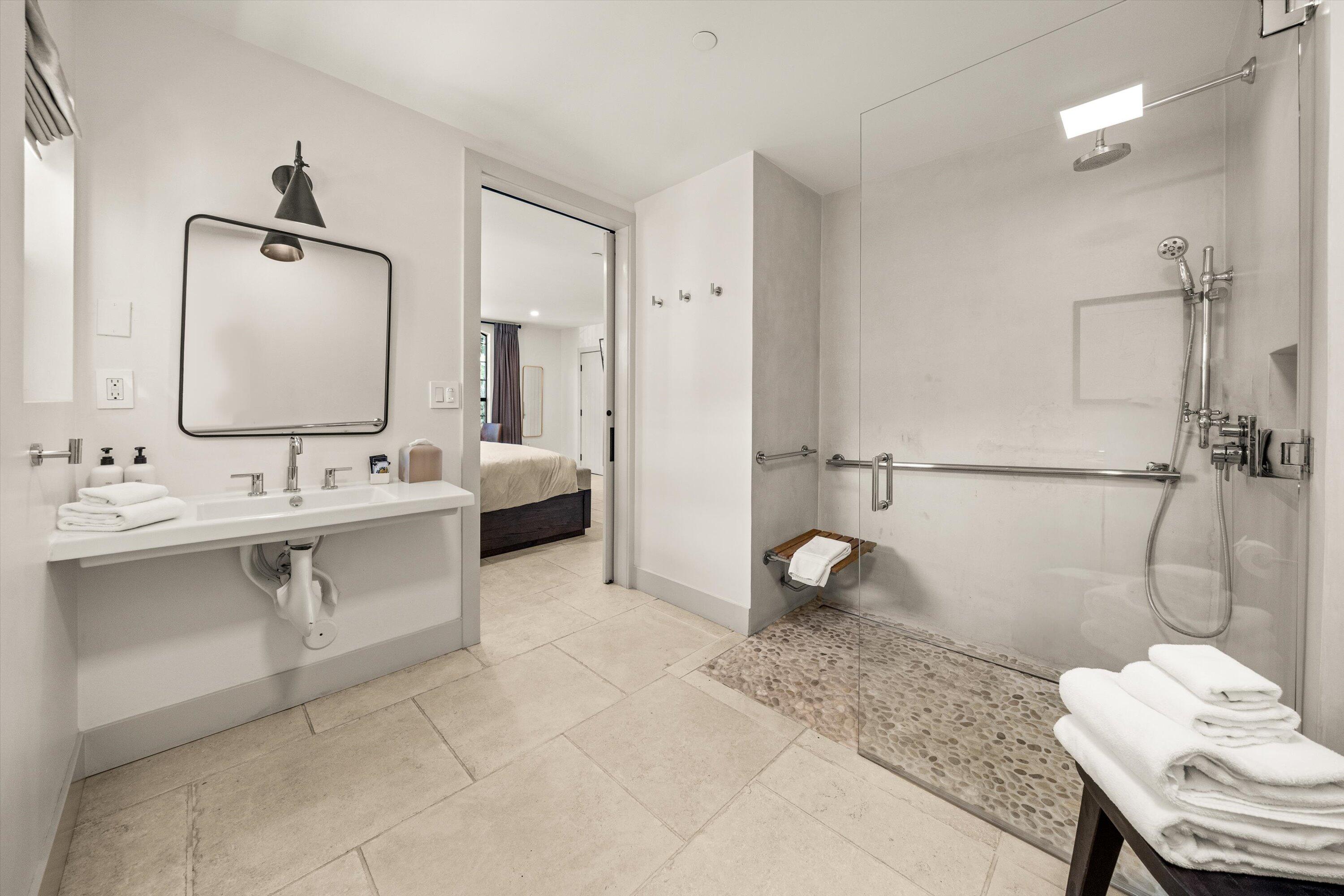 6 East Valerio Street Santa Barbara, CA 93101 - Photo 27 of 74 a bathroom with a sink and a mirror