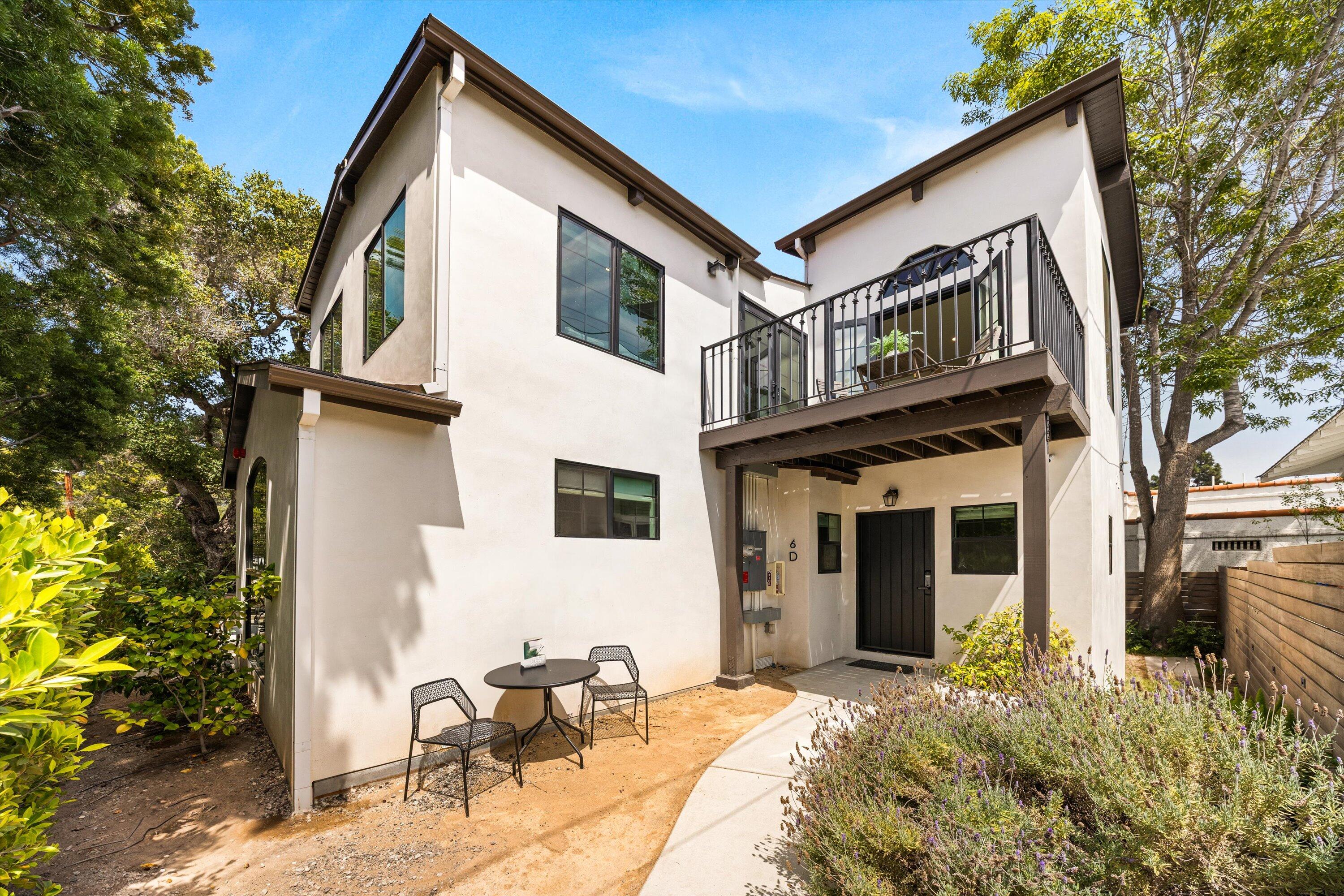 6 East Valerio Street Santa Barbara, CA 93101 - Photo 29 of 74 a view of a house with backyard and sitting area