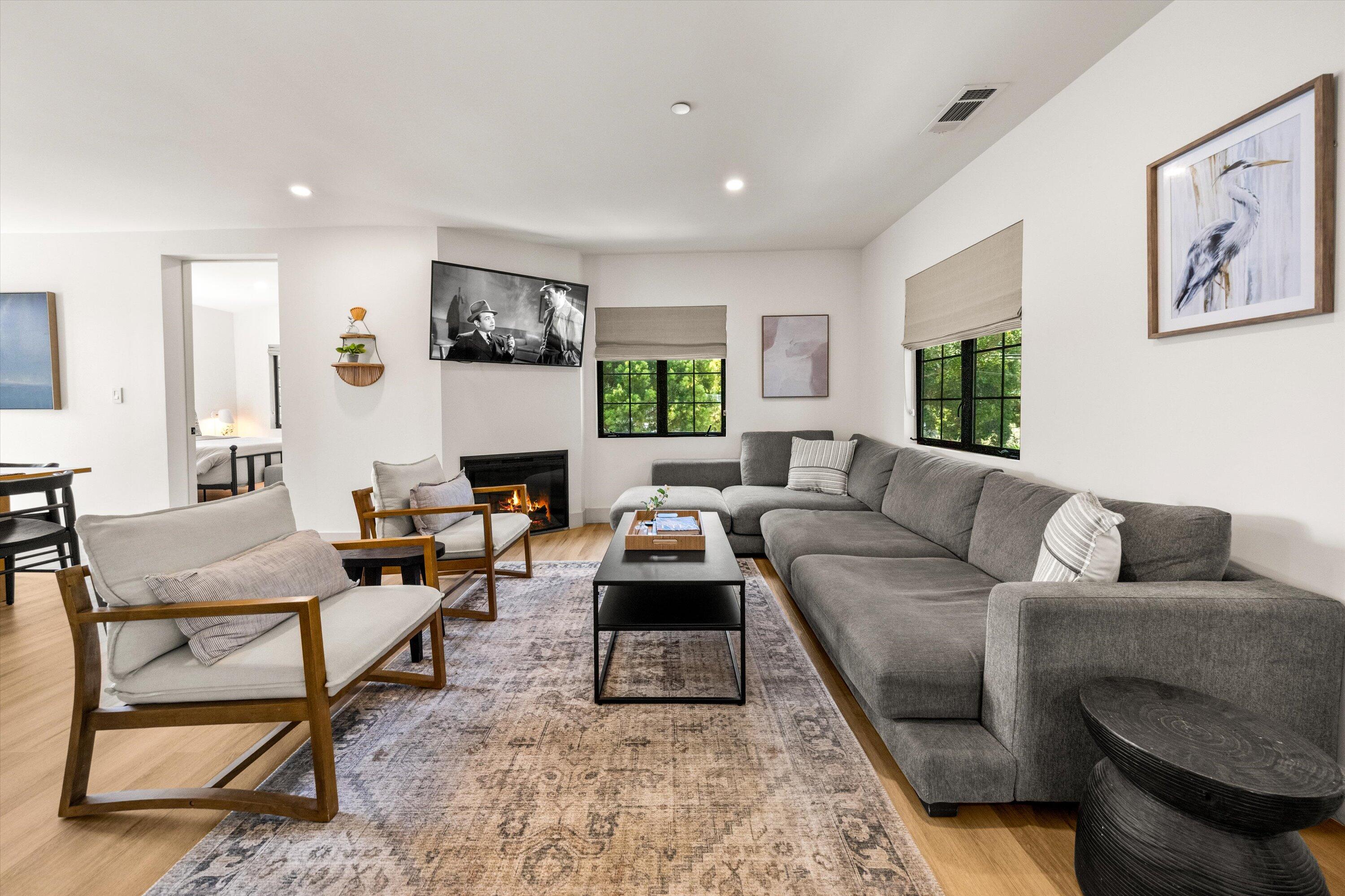 6 East Valerio Street Santa Barbara, CA 93101 - Photo 47 of 74 a living room with furniture and a wooden floor