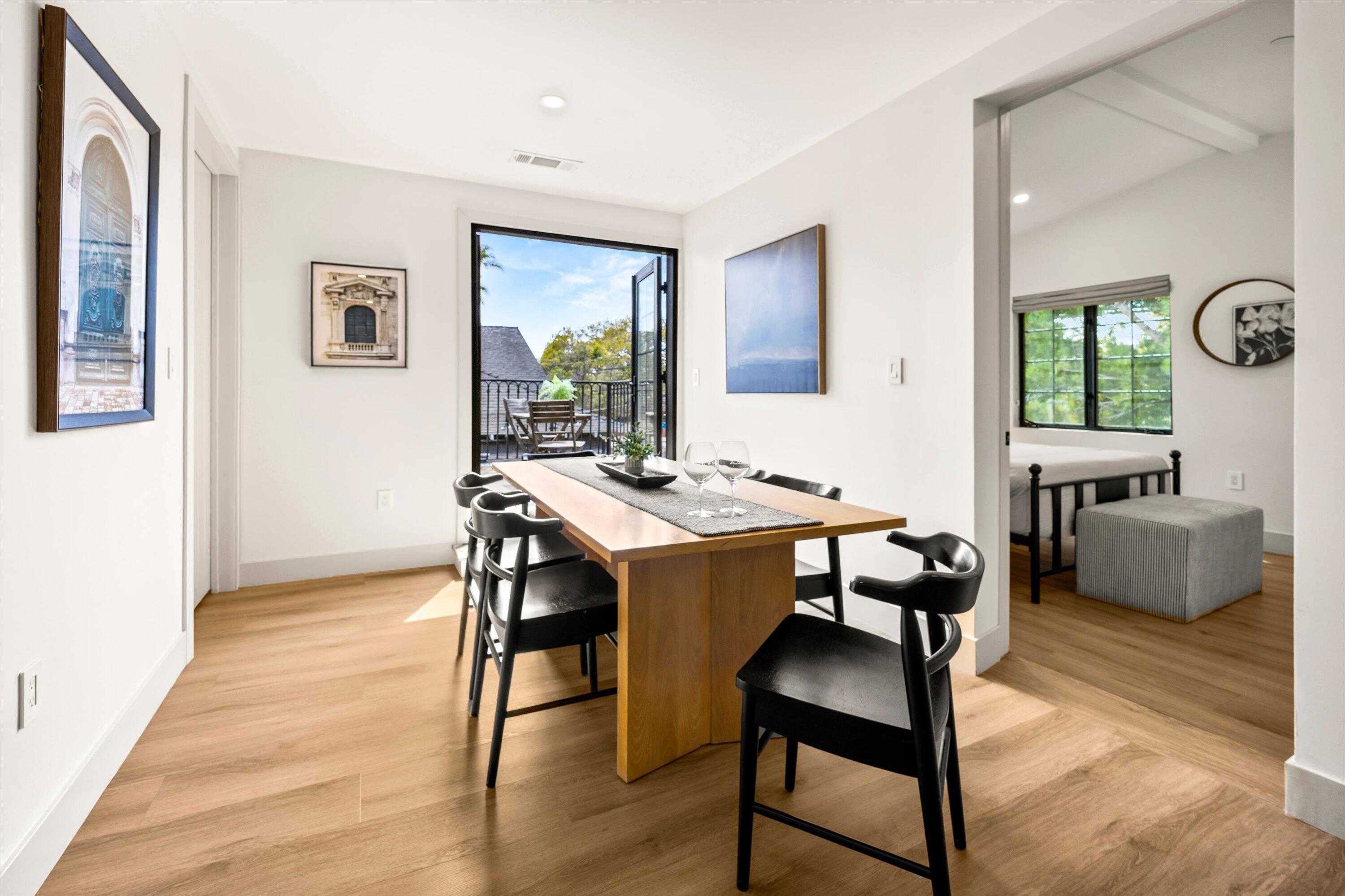 6 East Valerio Street Santa Barbara, CA 93101 - Photo 50 of 74 a view of a dining room with furniture and window