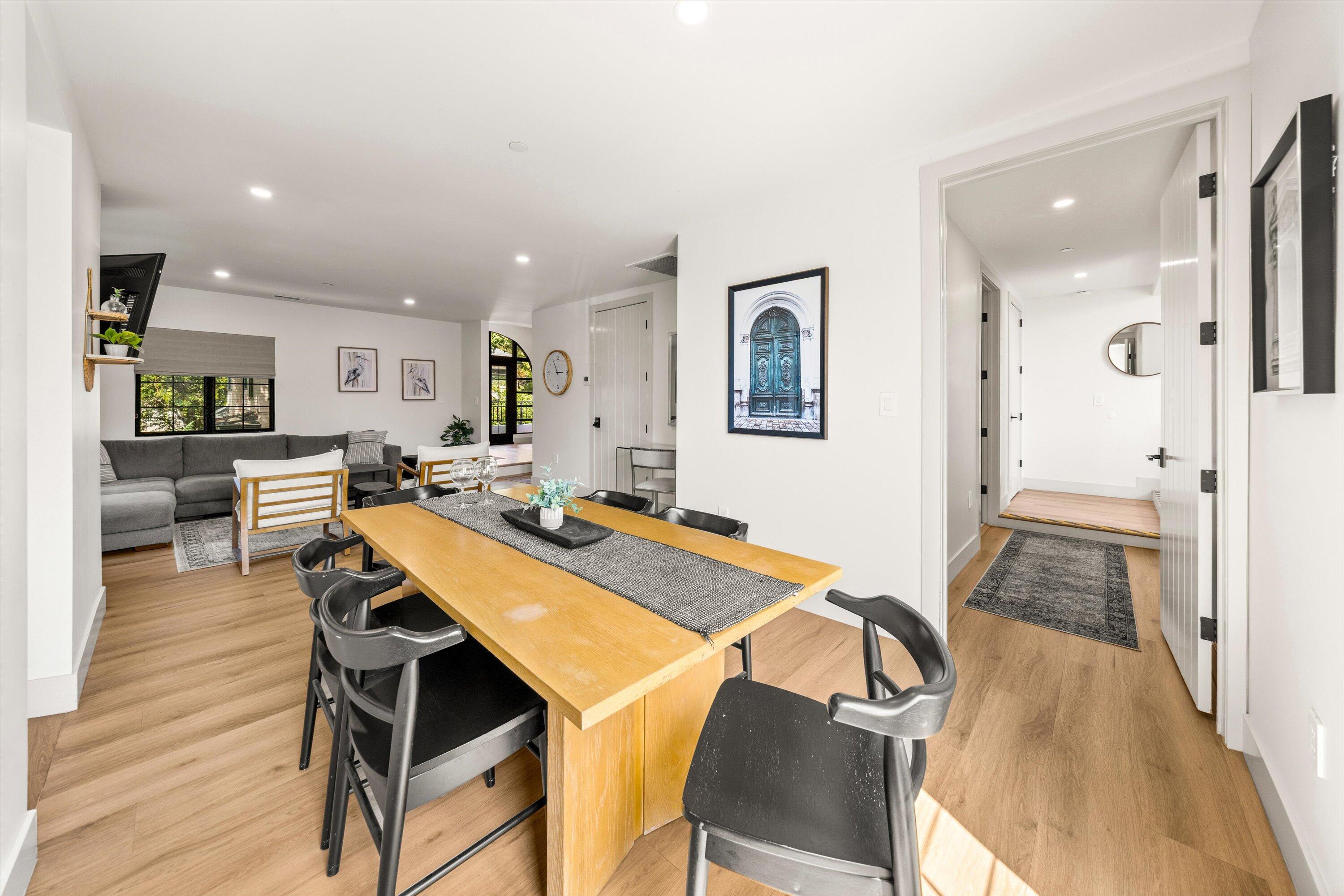 6 East Valerio Street Santa Barbara, CA 93101 - Photo 51 of 74 a living room with stainless steel appliances furniture a rug and a kitchen view