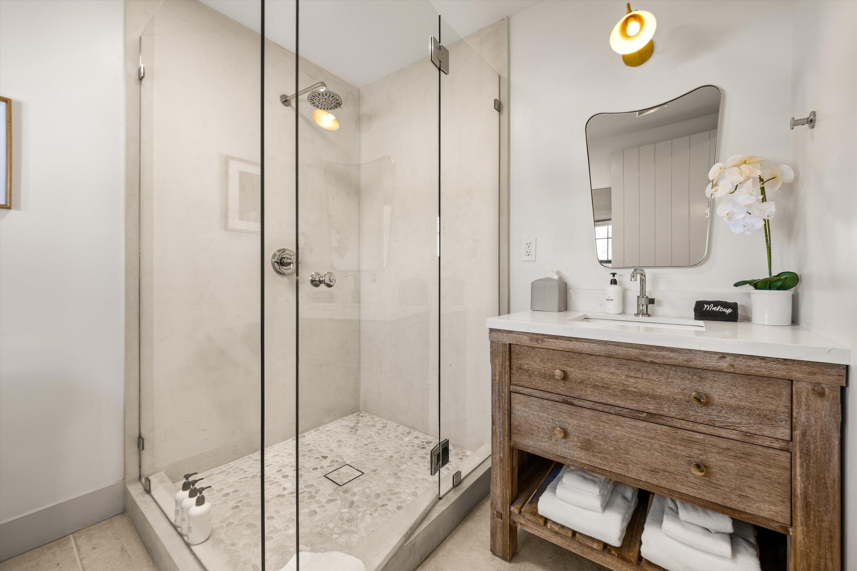 6 East Valerio Street Santa Barbara, CA 93101 - Photo 54 of 74 a bathroom with a sink and a mirror