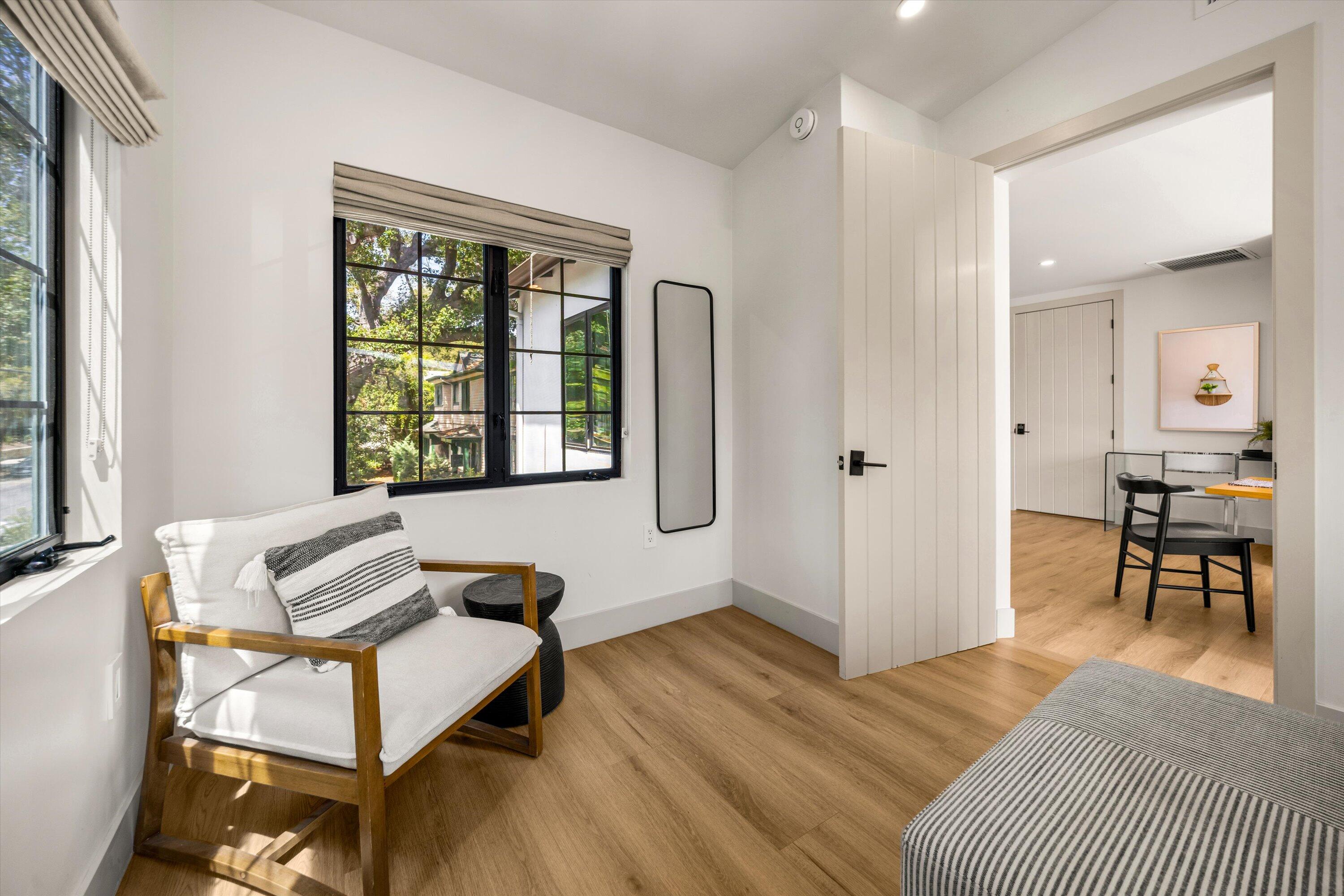 6 East Valerio Street Santa Barbara, CA 93101 - Photo 58 of 74 a living room with furniture and a window