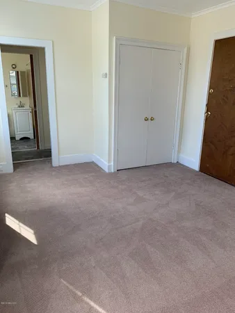 an empty room with closet