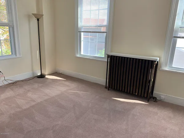 an empty room with windows