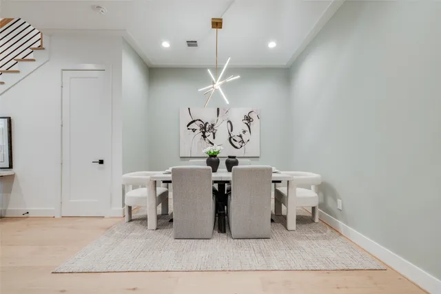 a bathroom with a sink a toilet a mirror and shower curtain