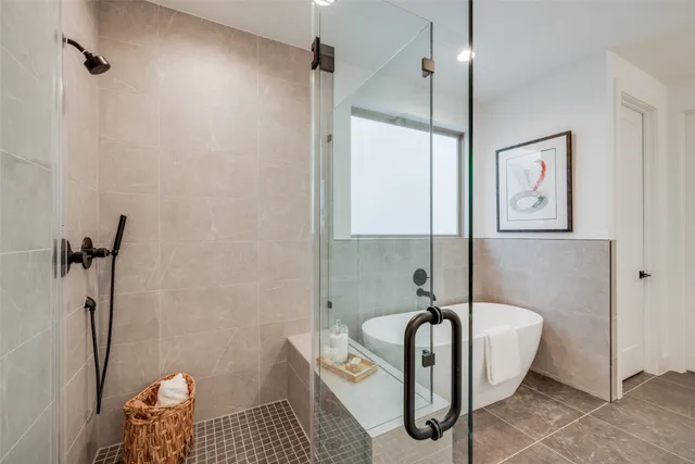 a view of cabinets and utility room with closet